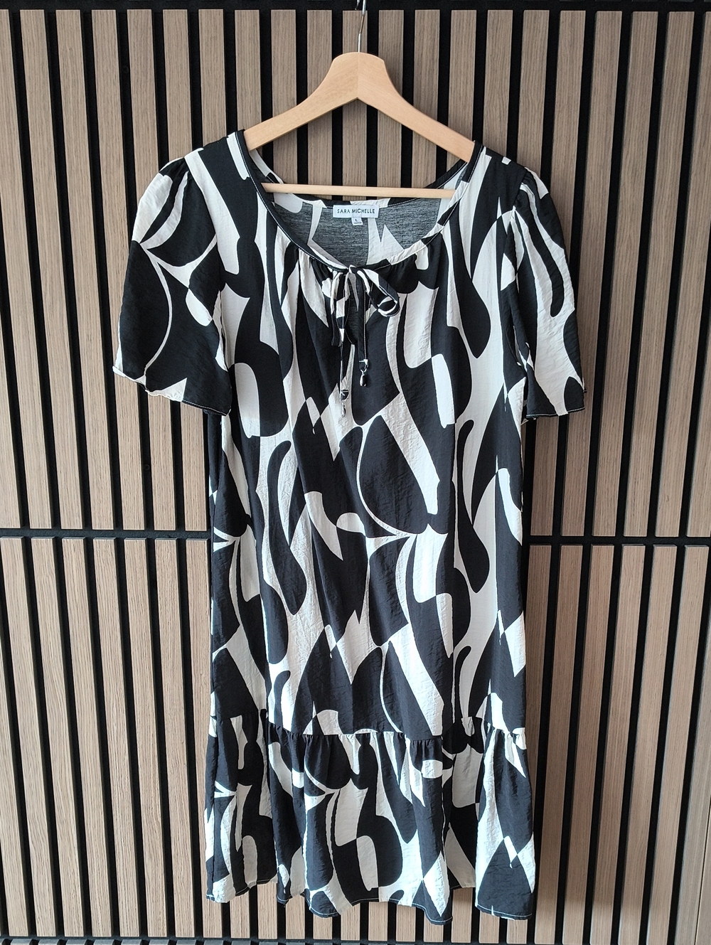 Sara Michelle Black & White Abstract Tie-Neck Mini Dress